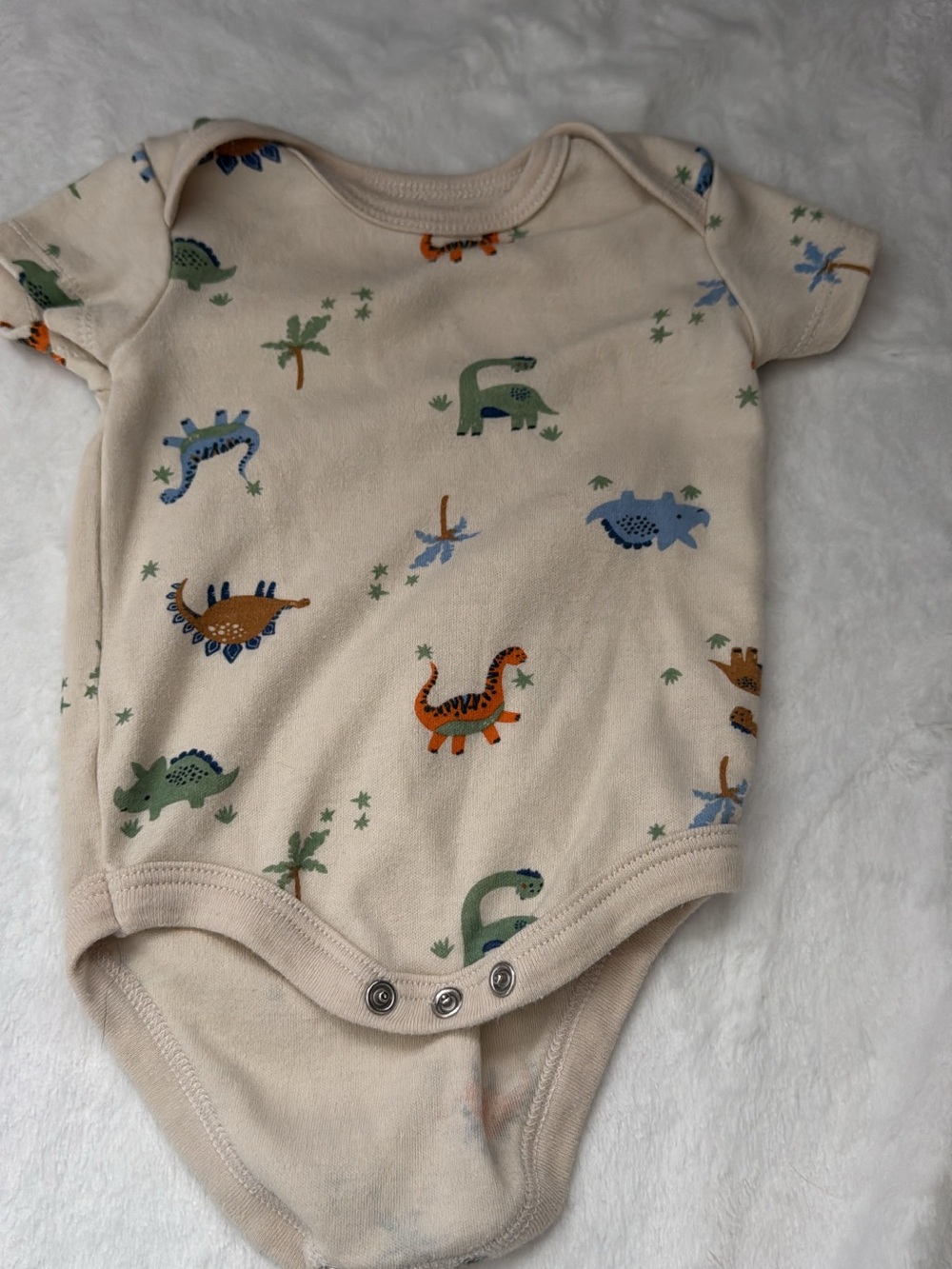 Carter's Cream One-Piece Bodysuit with Green, Blue and Orange Dinosaurs